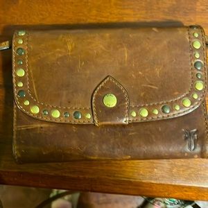Small Frye bag with cross body strap.